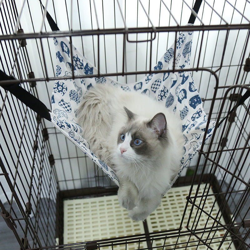 Hamac pour chat Hamacel blanc en lin, suspendu, au design épuré, idéal pour un coin détente.