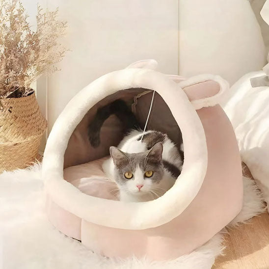 Niche chat Nestimal lumineuse, espace cosy avec jouet suspendu pour un repos apaisant des félins.